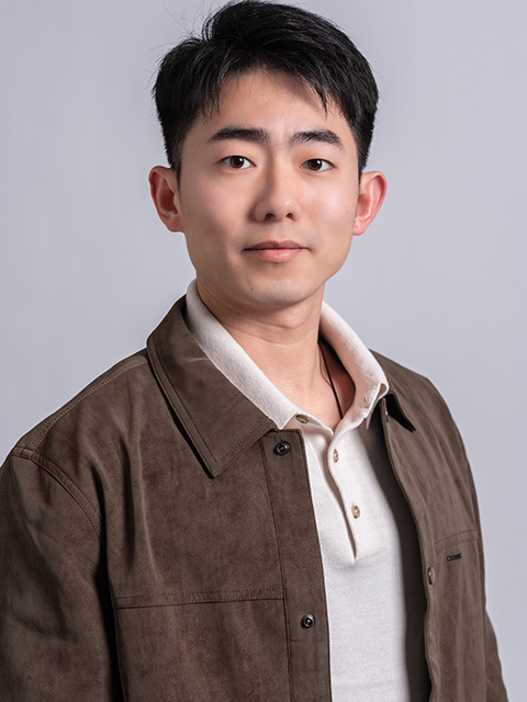 portrait photograph of staff member, Xuhui Cui